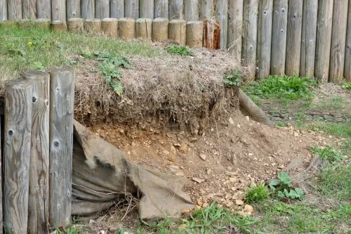 Damaged retaining wall made of wood