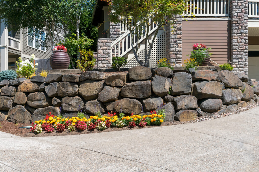 dry-stacked stones to form a retaining wall