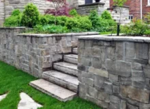 Natural Stone Retaining Wall in Backyard